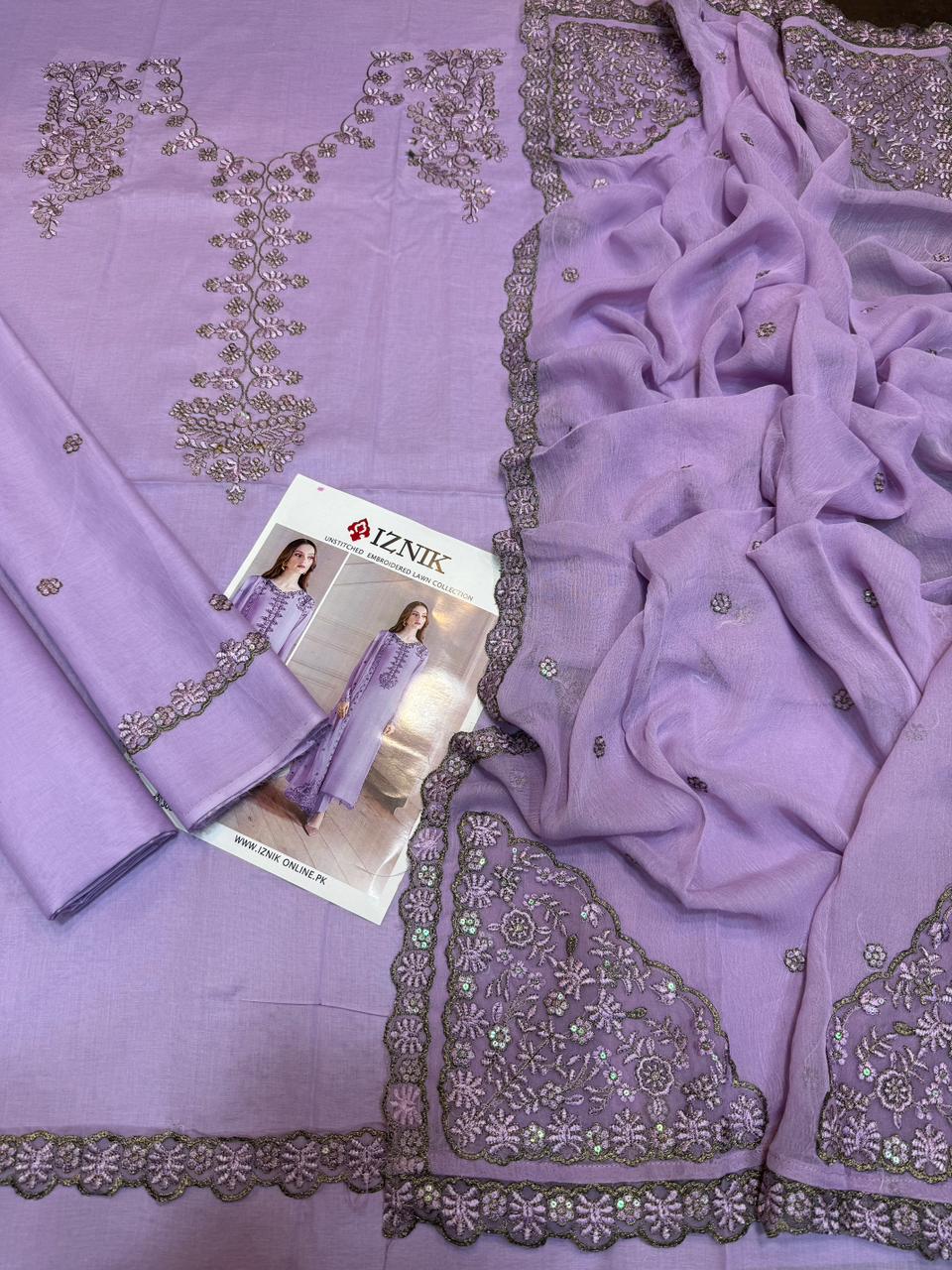 Shop the Iznik Luxury Collection embroidered 3-piece lawn suit with ready-to-wear chiffon dupatta. Order now from IZ Pattern and Place.