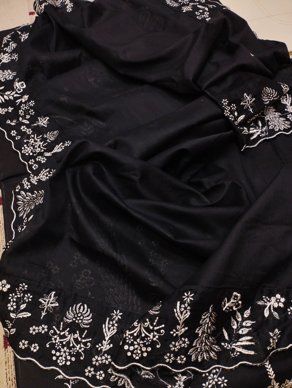 Shop the Hussain Rehar Luxury Airjet Lawn embroidered 3-piece suit with lawn voile dupatta. Order now from IZ Pattern and Place.
