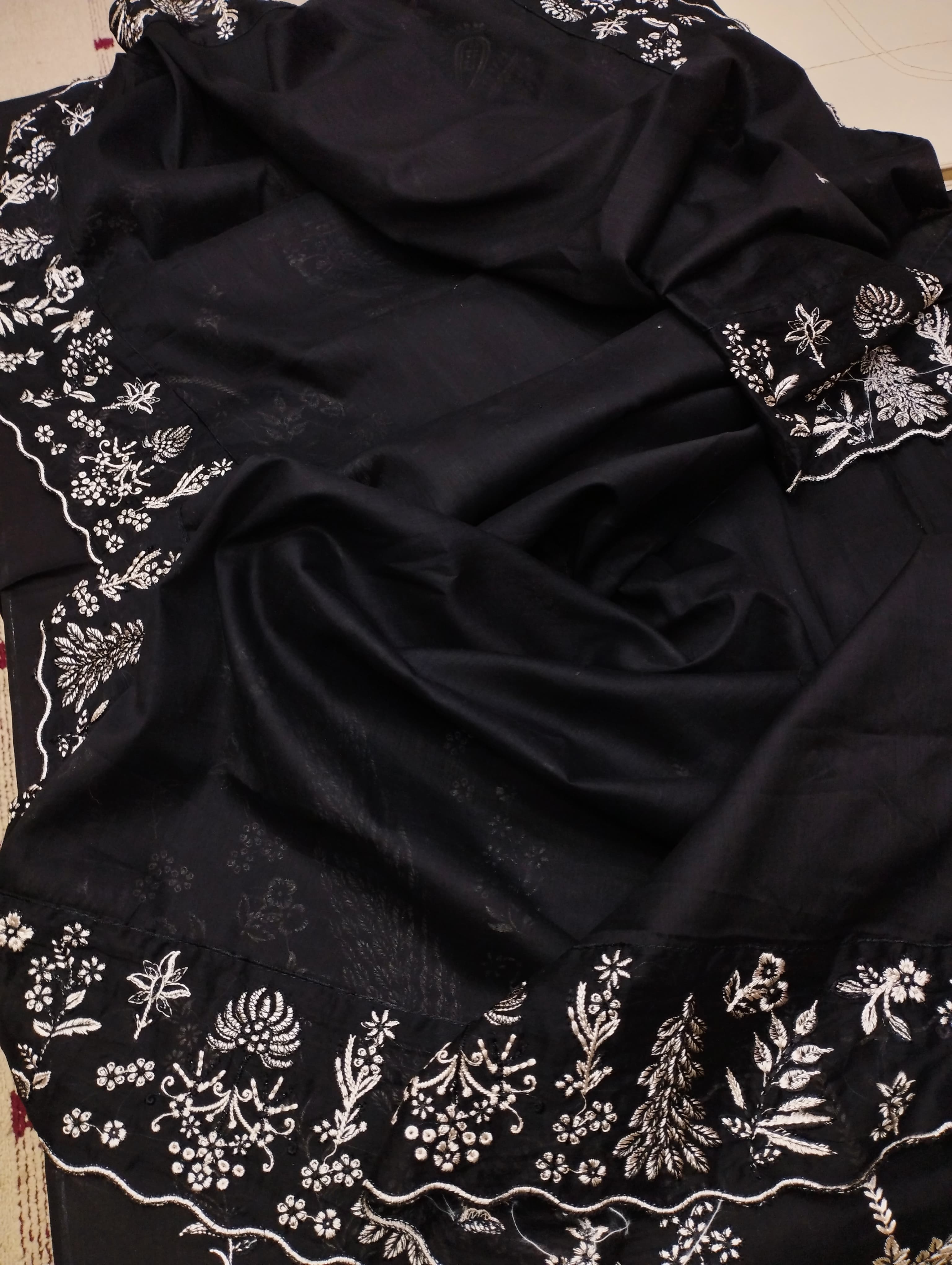 Shop the Hussain Rehar Luxury Airjet Lawn embroidered 3-piece suit with lawn voile dupatta. Order now from IZ Pattern and Place.