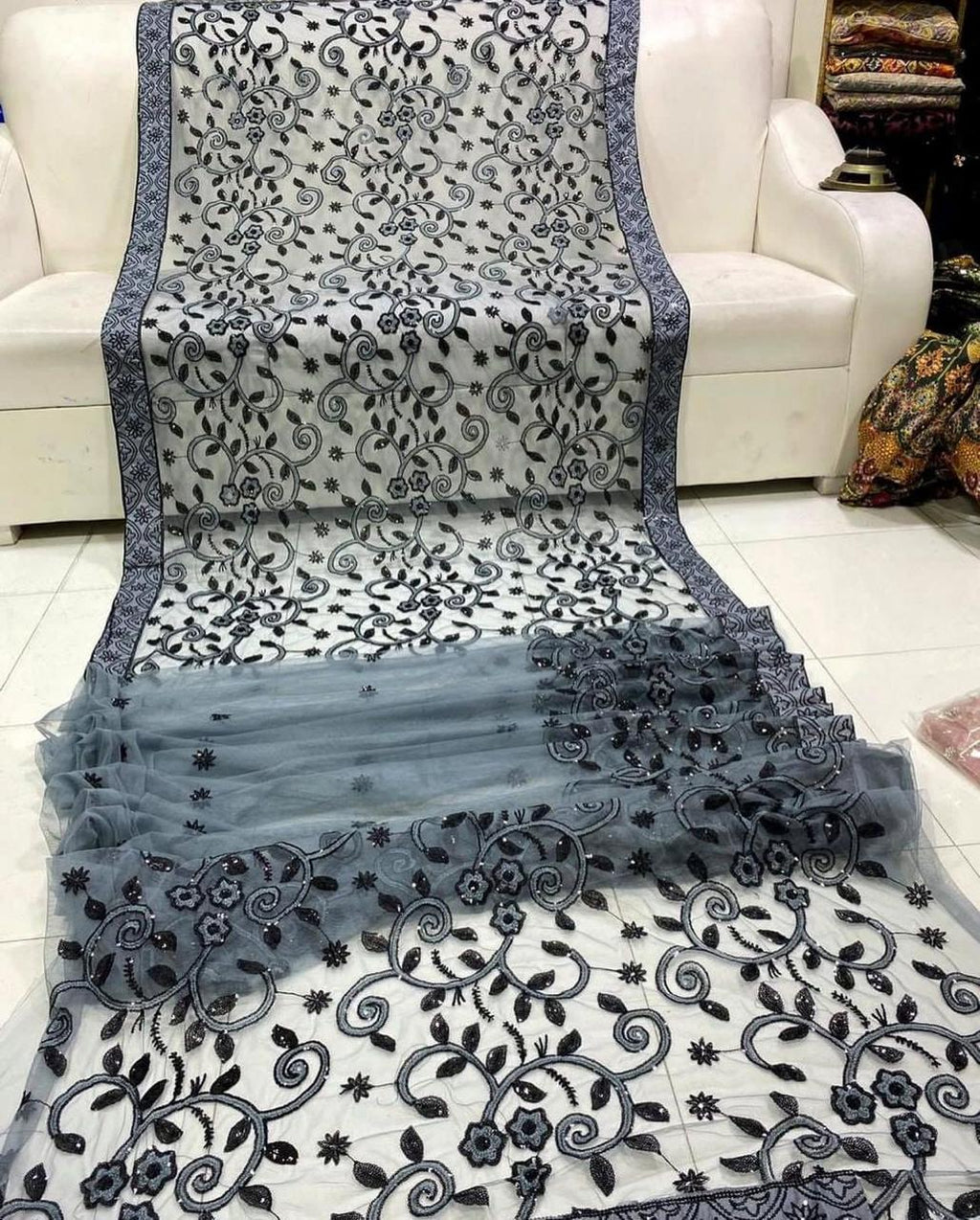 Shop the Designer Soft Net embroidered saree with heavy sequence work for weddings and festive occasions. Order now from IZ Pattern and Place.