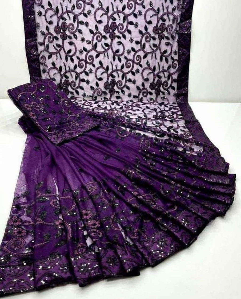Shop the Designer Soft Net embroidered saree with heavy sequence work for weddings and festive occasions. Order now from IZ Pattern and Place.