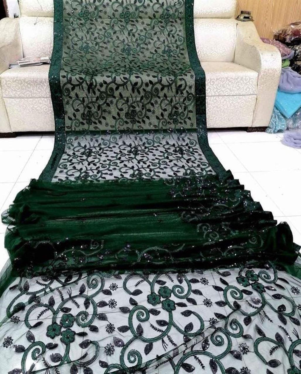 Shop the Designer Soft Net embroidered saree with heavy sequence work for weddings and festive occasions. Order now from IZ Pattern and Place.