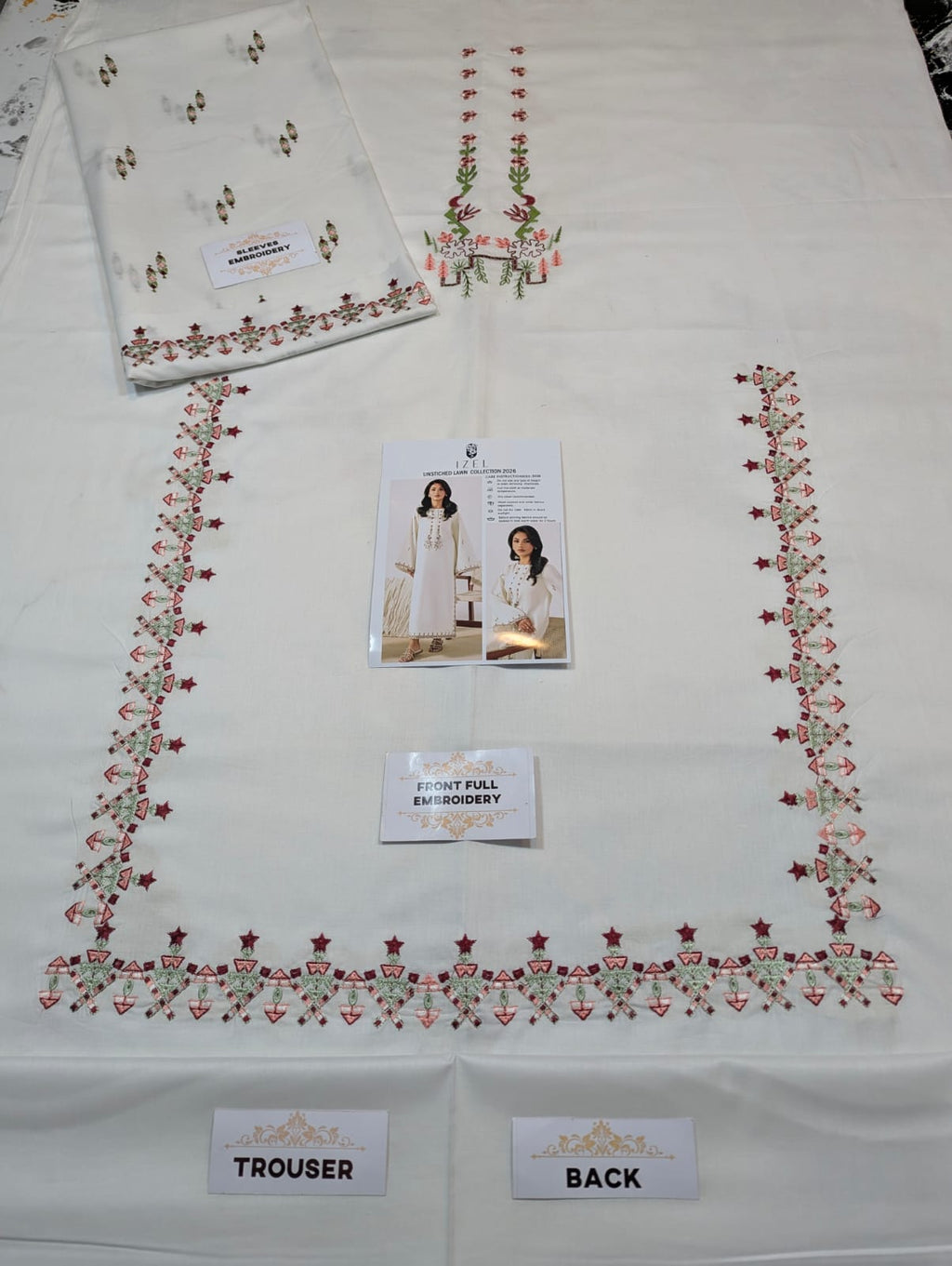 Shop the IZel premium embroidered lawn 2-piece unstitched suit with heavy embroidered front and sleeves. Order now from IZ Pattern and Place.