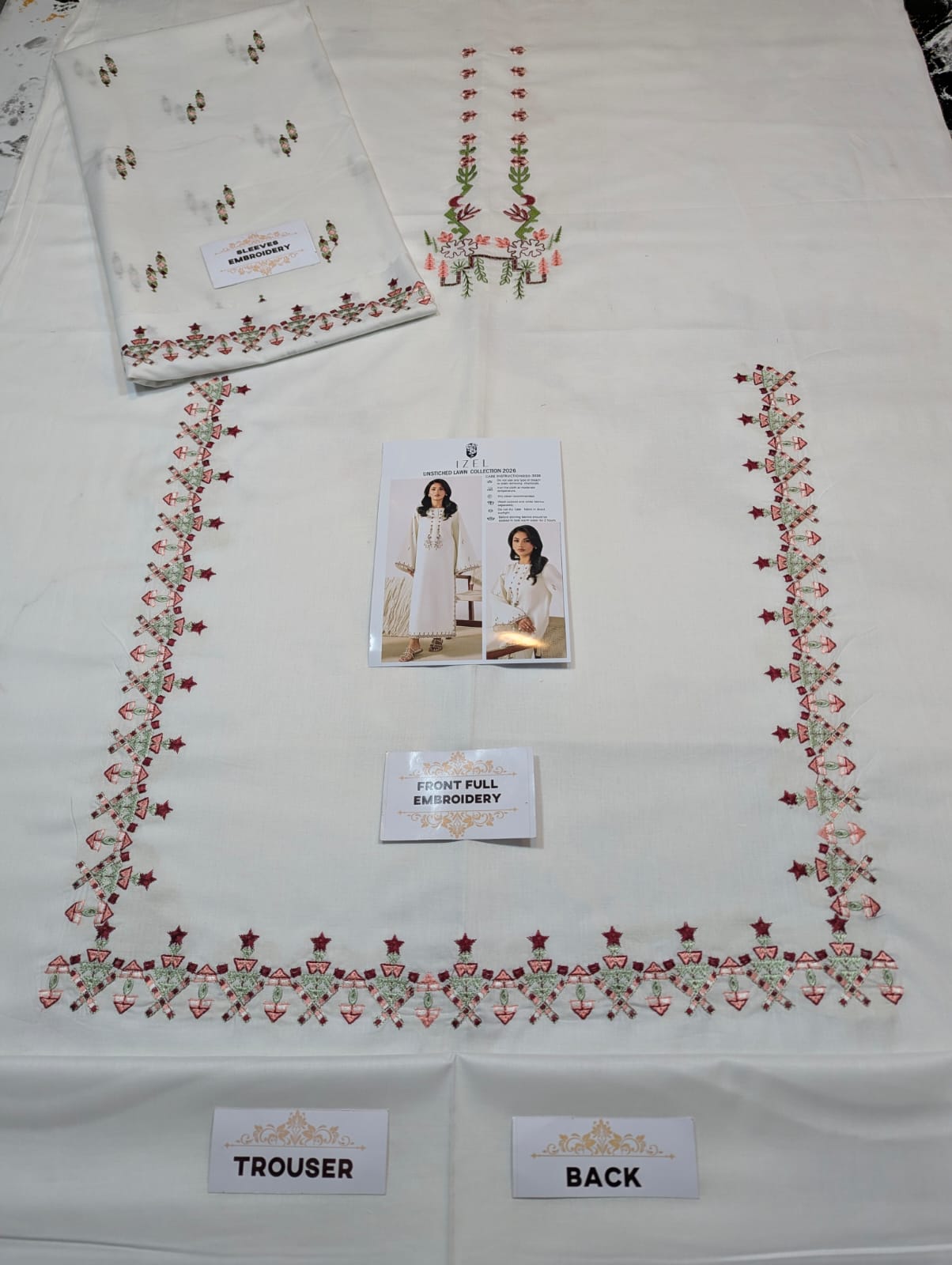 Shop the IZel premium embroidered lawn 2-piece unstitched suit with heavy embroidered front and sleeves. Order now from IZ Pattern and Place.