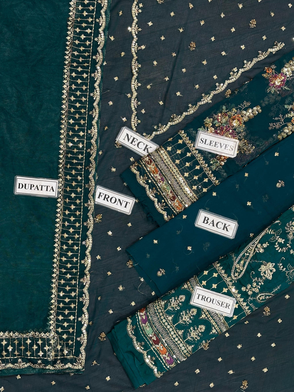 Shop the Charizma Royal Premium chiffon 3-piece unstitched suit with net dupatta, raw silk trouser, Adda work, and sequence embroidery. Order now from IZ Pattern and Place.