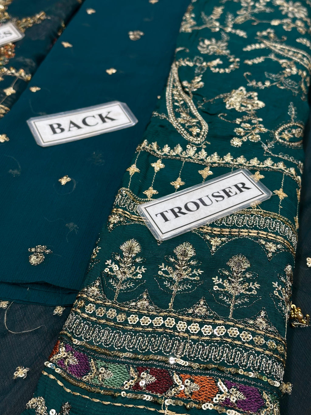 Shop the Charizma Royal Premium chiffon 3-piece unstitched suit with net dupatta, raw silk trouser, Adda work, and sequence embroidery. Order now from IZ Pattern and Place.