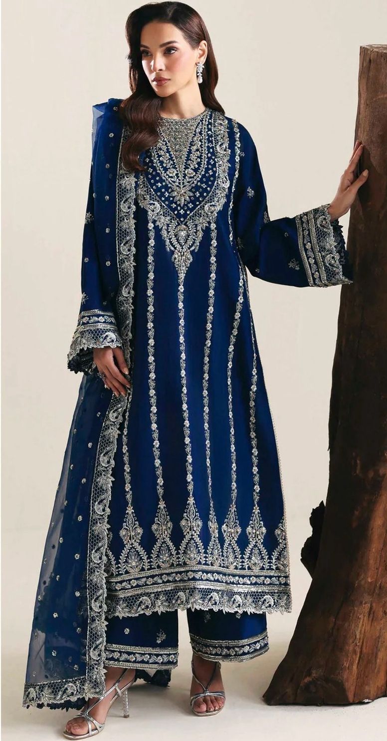 Shop the Akbar Aslam luxury lawn 3-piece unstitched suit with embroidered front, sleeves, border, and embroidered chiffon dupatta. Order now from IZ Pattern and Place.