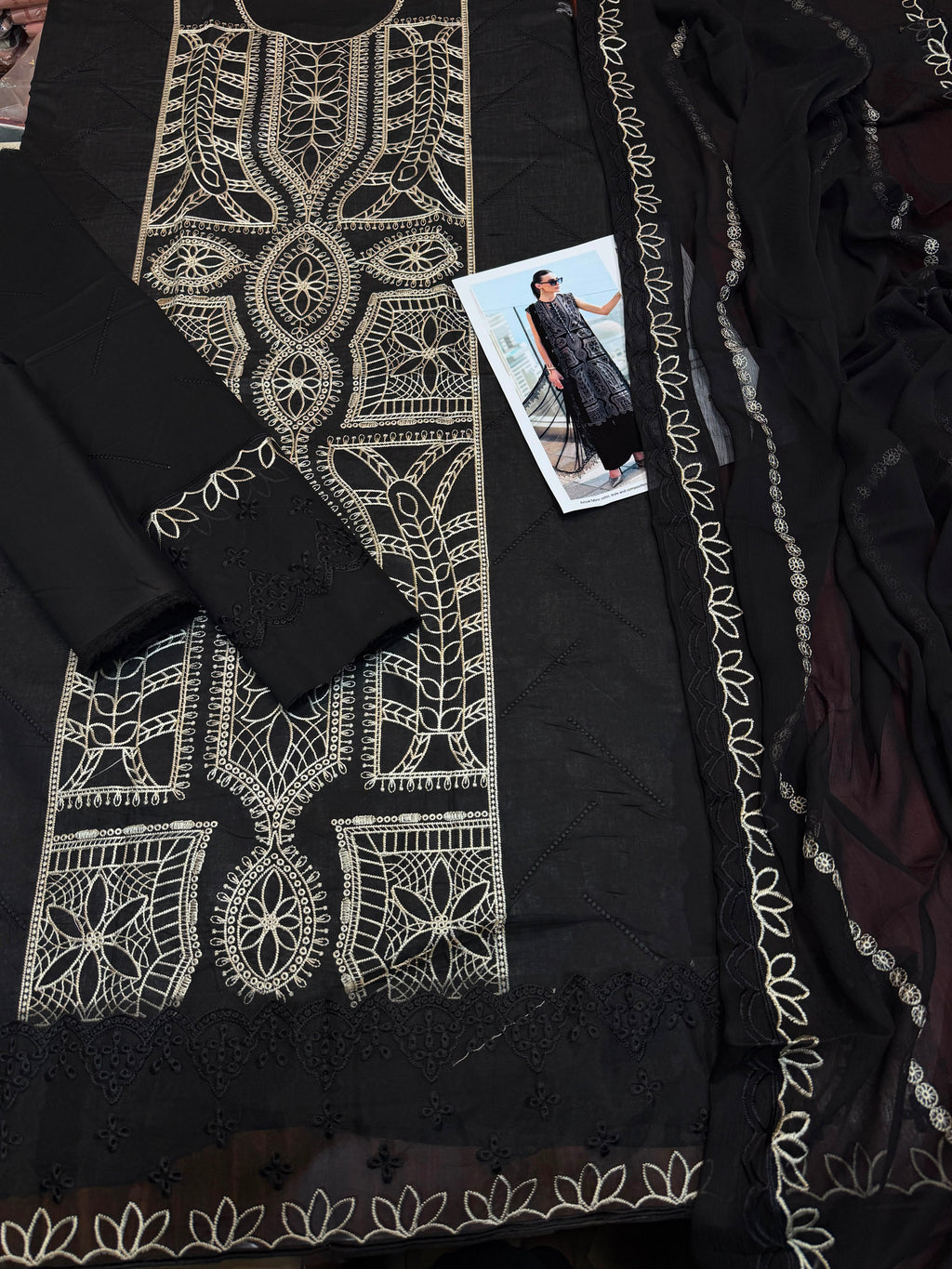 Shop the Maria. B luxury lawn 3-piece unstitched suit with embroidered front, sleeves, border, and embroidered chiffon dupatta. Order now from IZ Pattern and Place.