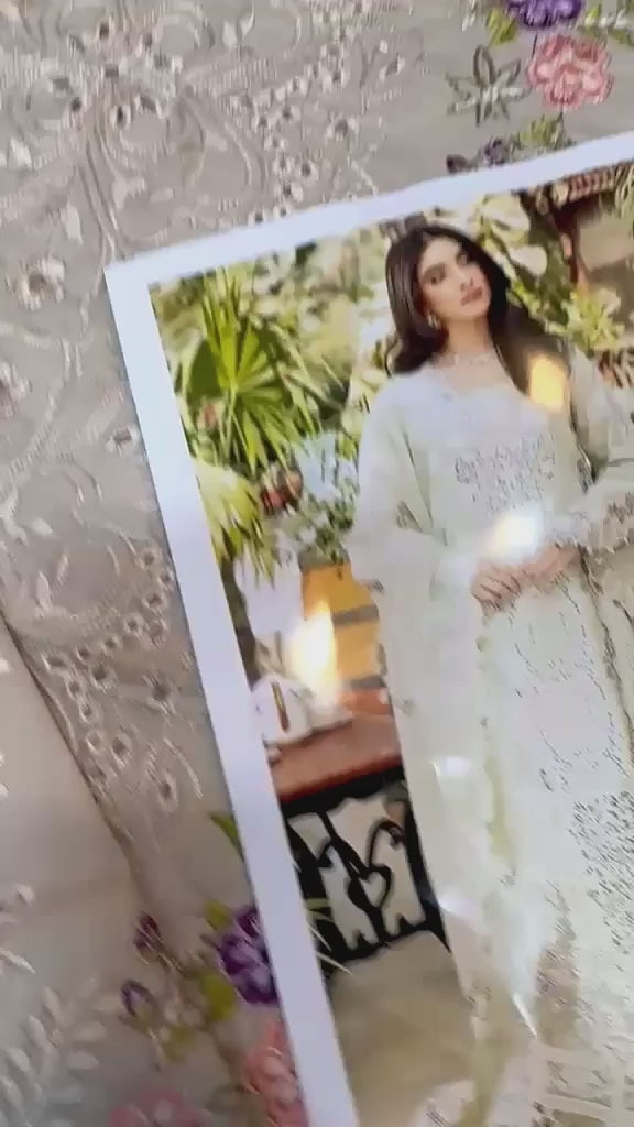 Shop the Elaf luxury lawn 3-piece suit with embroidered front, sleeves, border, embroidered trouser, and ready-to-wear embroidered chiffon dupatta. Order now from IZ Pattern and Place.